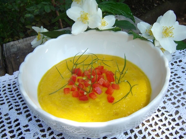 Creamy Carrot Soup in a white ceramic bowl - recipes for vegan soups